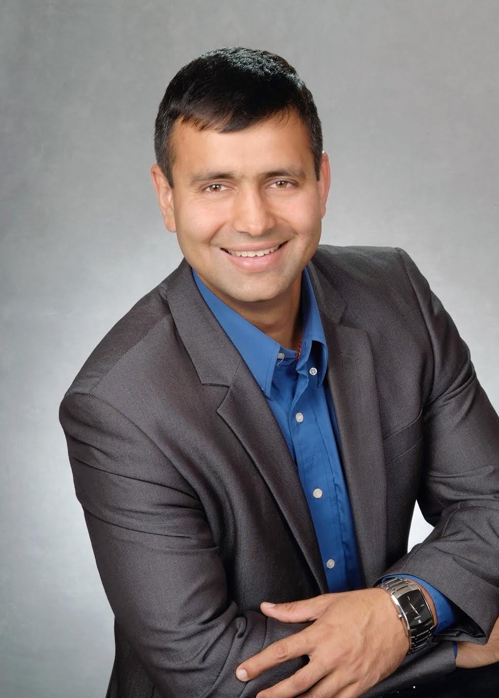 Ravi Hooda, RCIC — Setu Immigration Services